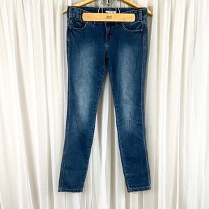 Free People size 27 women’s dark wash mid rise skinny jeans